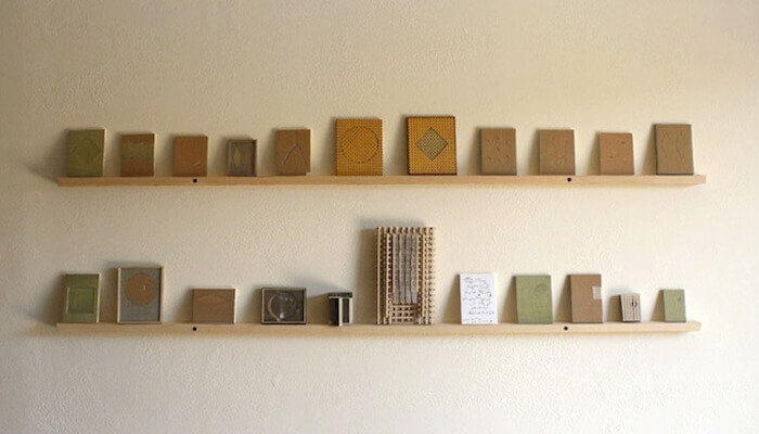 Ken Weathersby, Time Is the Diamond, 2011, wood, linen, acrylic, paper collage, small works on wood shelves, from 2.5 to 8 inches tall (courtesy of the artist)